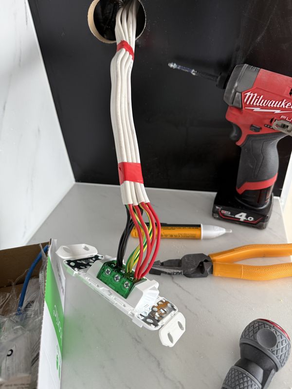 Fit-off: new double power point being terminated, with circuits neatly bundled and labelled, Birrong, NSW