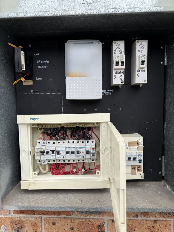 Before: old switchboard with ageing breakers and separate air conditioning circuits, Chester Hill, NSW